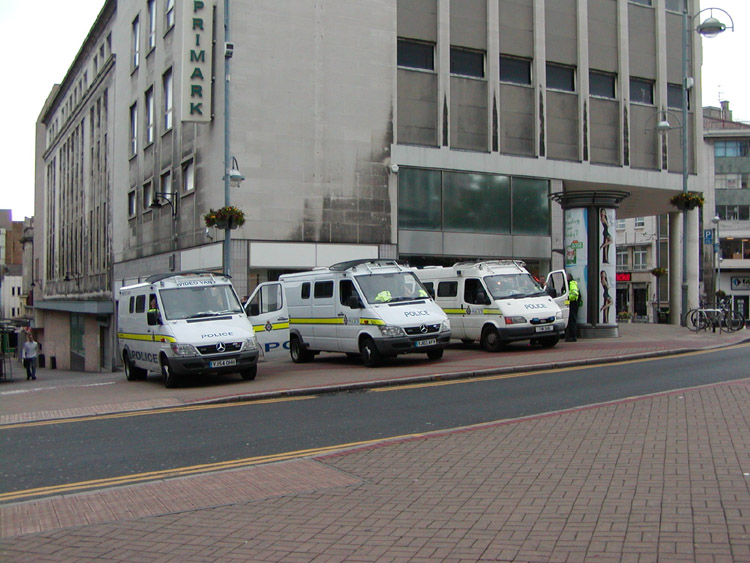 Police vans parked near Castle Square