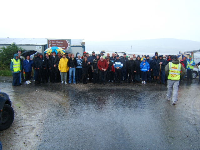 crowds gather in the moist west coast weather to start the long walk to Dublin